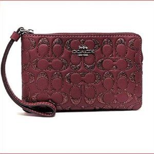 COACH Corner Zip Signature Glitter Wine Leather Wristlet